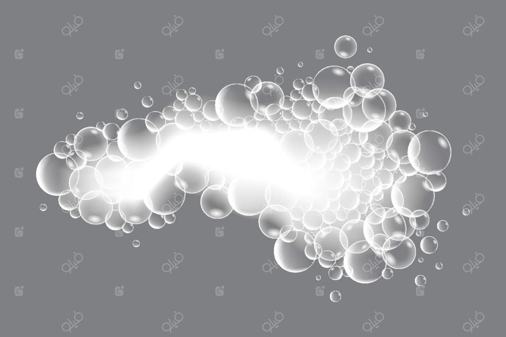 حباب‌های صابون با طرح‌های منحصر‌به‌فرد که با ظرافت روی سطحی خاکستری و ساده شناورند