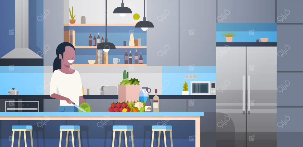 زن آفریقایی-آمریکایی در حال آماده‌سازی سالاد در آشپزخانه مدرن