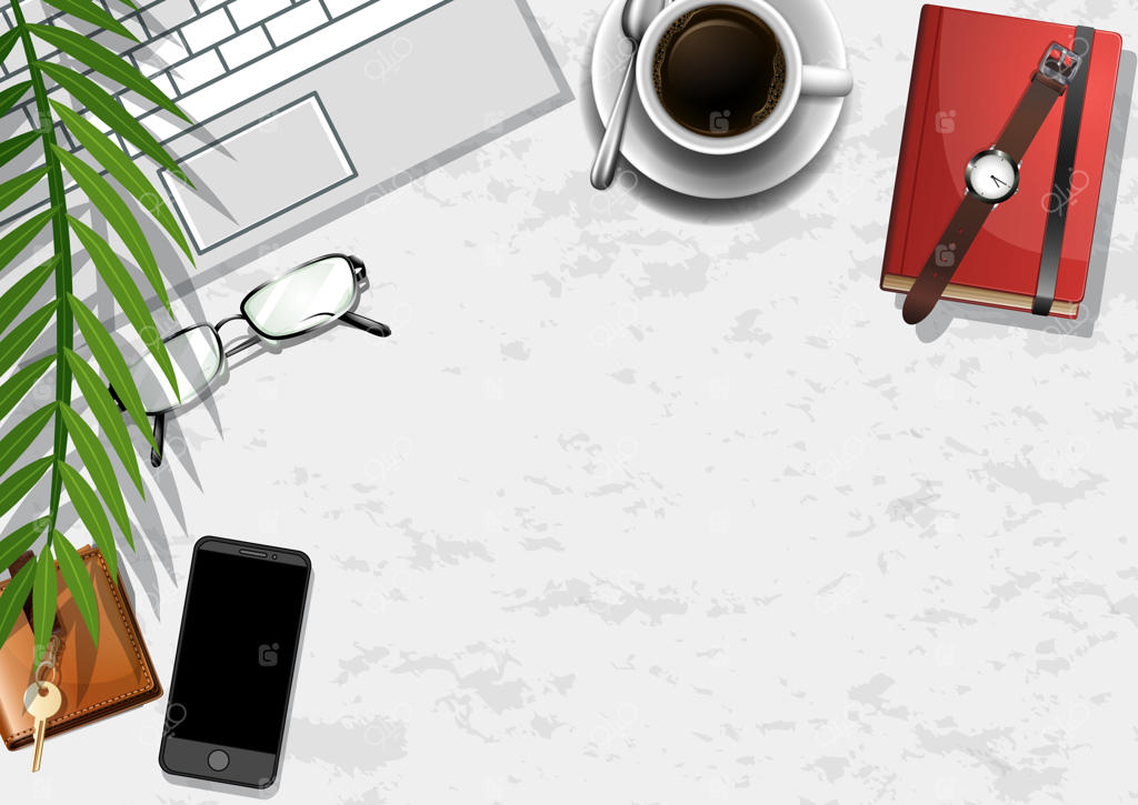 نمای بالا از میز کار اداری با عناصر دفتر و برگ‌های سبز