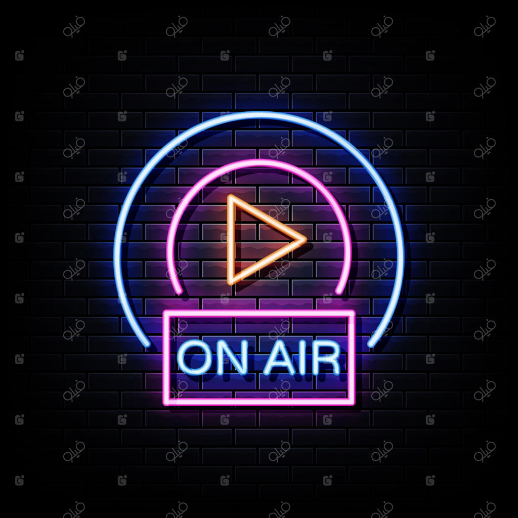 تابلو نئون "پخش زنده" روی دیوار آجری سیاه
