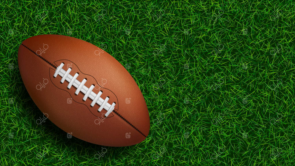 توپ فوتبال آمریکایی روی چمن سبز استادیوم - تجهیزات ورزشی توپ چرمی