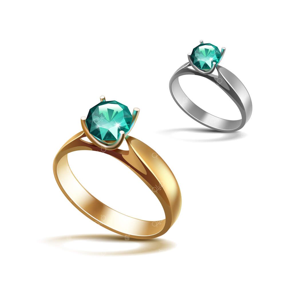 حلقه‌های نامزدی طلا و نقره با الماس و زمرد براق - نمای نزدیک روی سفیدگان