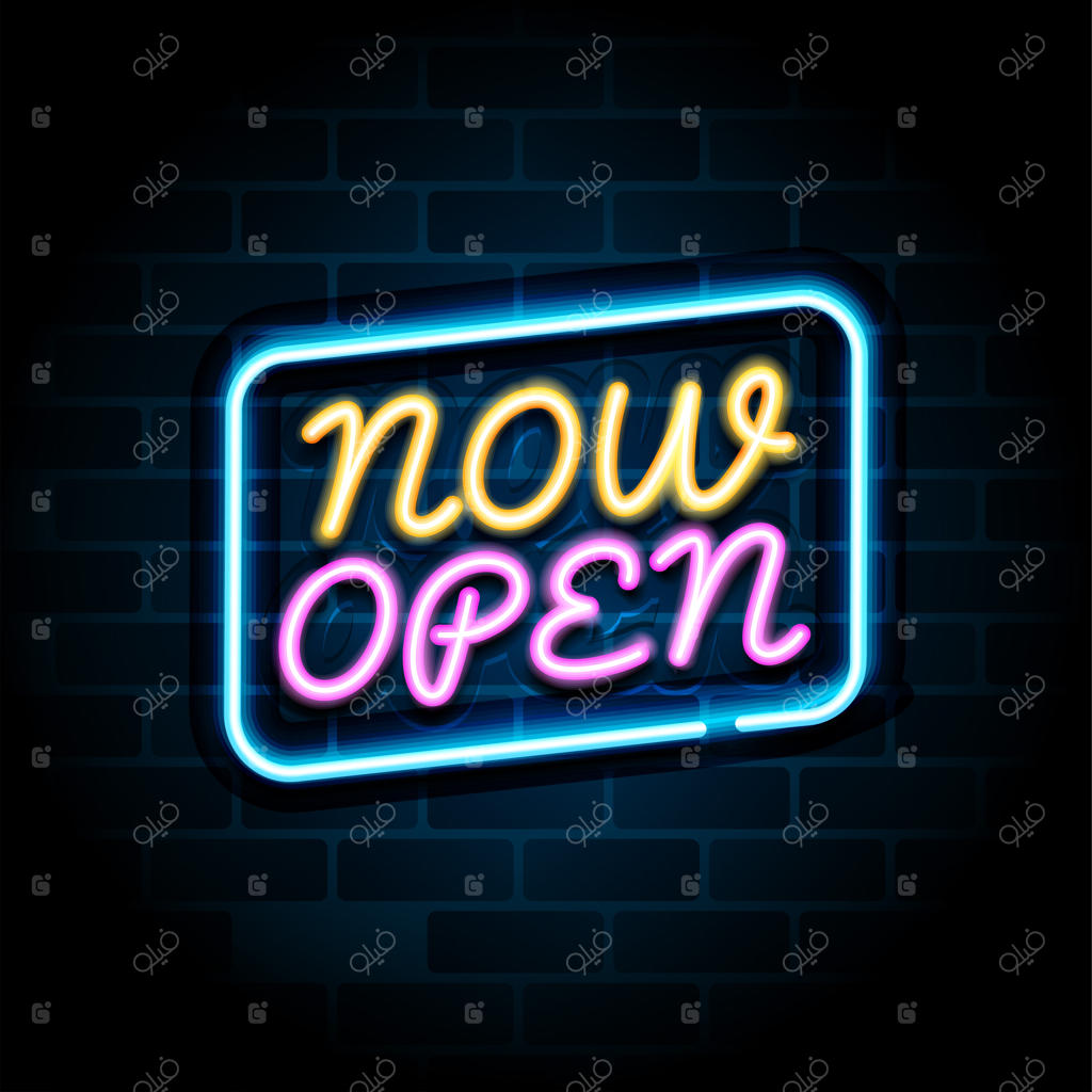 تابلوی نئون روشن روی دیوار آجری